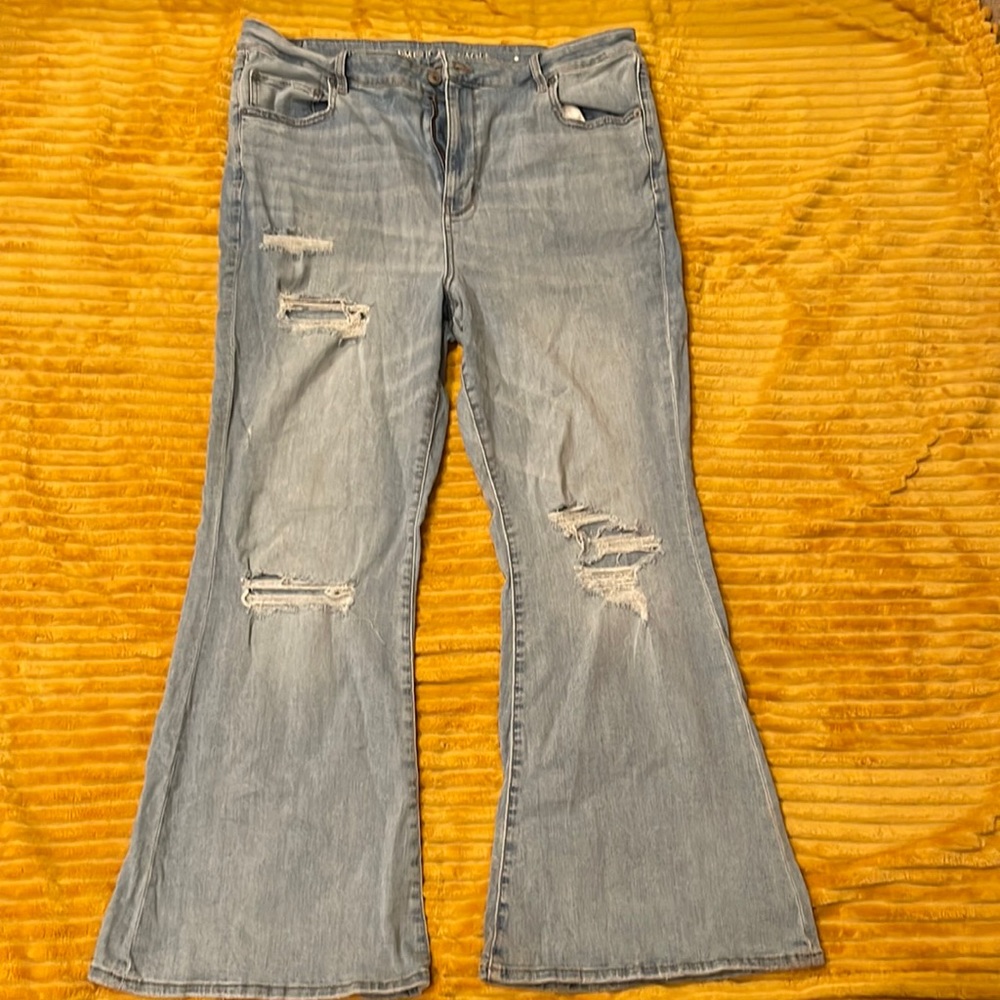 American Eagle. Light denim, distressed flairs.